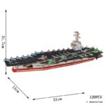 Modèle de navire de guerre en bois avec détails précis et dimensions indiquées.