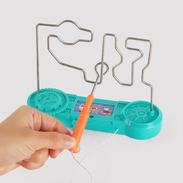 Pistolet à fil pour jeu scientifique avec mécanisme de manipulation de fil métallique, idéal pour activités éducatives et expérimentations scientifiques pour enfants.