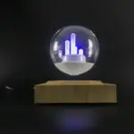 Lampe LED décorative en forme de globe avec éléments lumineux violets, idéale pour une décoration moderne et scientifique.