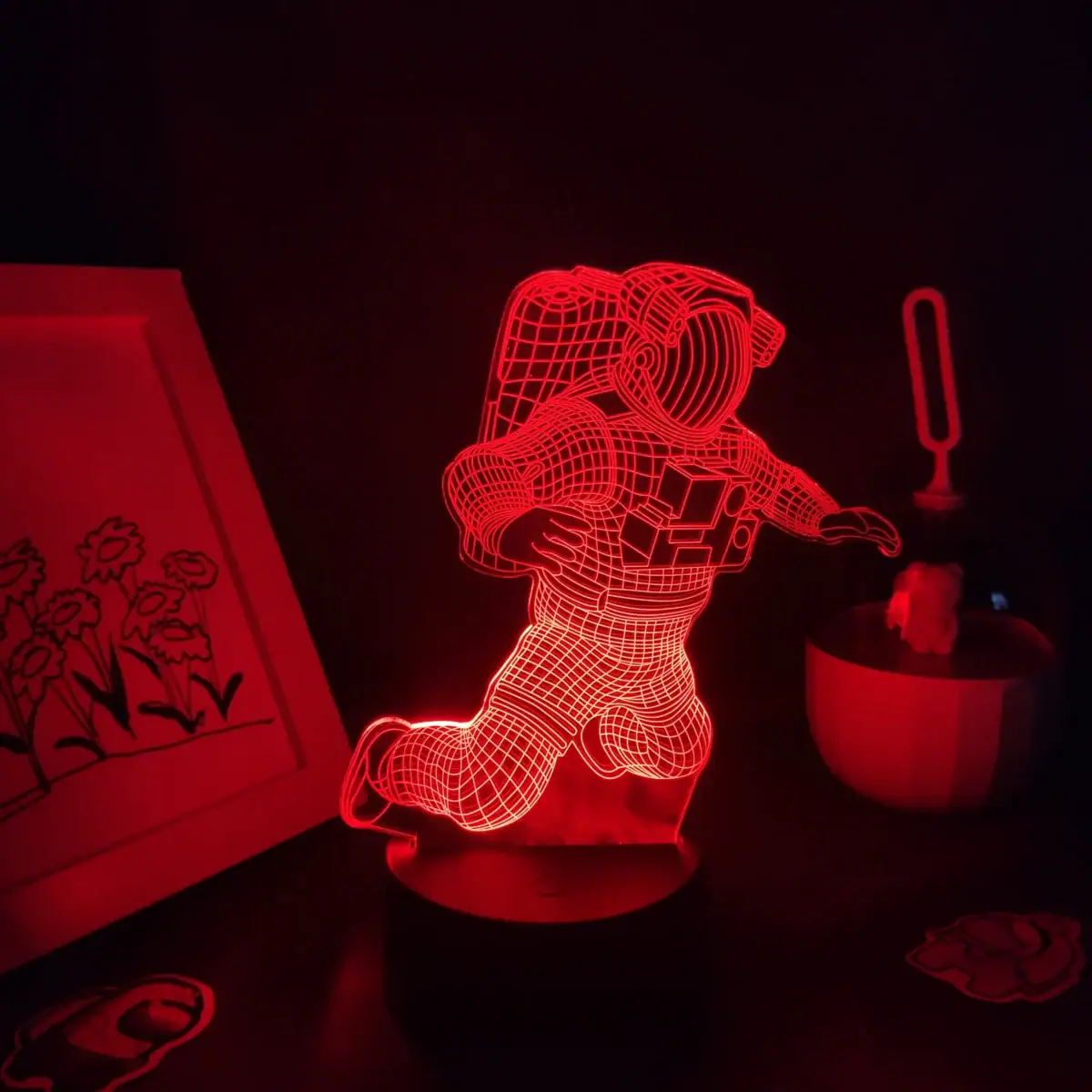 Vêtement d'astronaute en 3D lumineux, décoratif et original, parfait pour les amateurs de science et d'espace.