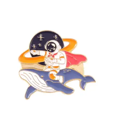 Pin's astronaute et baleine, décoration scientifique et marine.