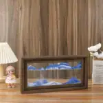 Vitrine en bois contenant une scène de montagnes en résine bleue et blanche, idéale pour une décoration scientifique ou naturelle.
