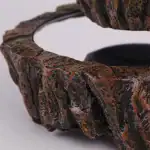 Cercle décoratif en pierre naturelle avec surface texturée et finition polie, idéal pour la décoration intérieure ou extérieure, apportant une touche élégante et naturelle à votre espace.
