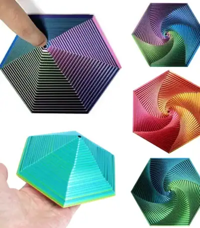 Hexagone en spirale colorée en plastique 3D, objet scientifique décoratif, avec motifs géométriques en dégradé de couleurs vives, idéal pour la décoration ou l'étude de formes.