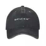 Casquette noire avec logo SpaceX blanc vue de face, texture délavée, visière courbée, détails de couture visibles.