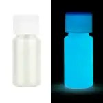 Petite bouteille de laboratoire qui brille dans l'obscurité, idéale pour la décoration scientifique ou pour des expériences éducatives.
