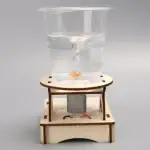 Vitrine à expérience scientifique avec liquide et moteur miniature, idéale pour la décoration et l'éducation scientifique.