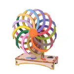 Modèle de roue de Newton en bois peint en couleurs vives, illustrant le principe de la conservation de l'énergie par mouvement rotatif.